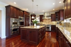 Luxury ranch style home kitchen with high end appliances and a granite kitchen counter top.