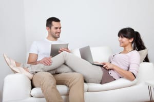 Couple Shopping for homes online.
