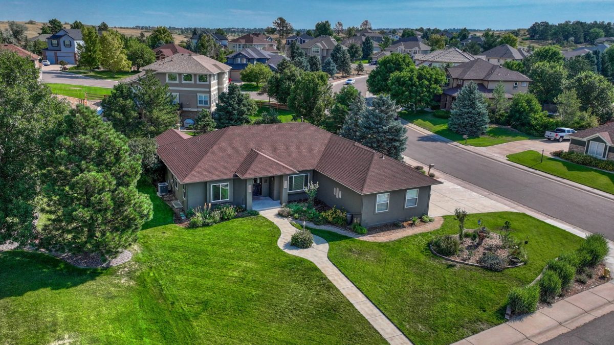 Aerial exterior of the ranch home at 7170 Windwood Way Parker CO