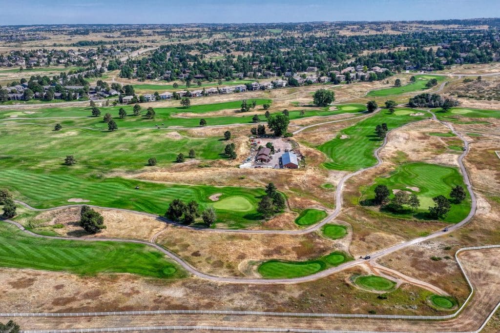 The Pinery Neighborhood in Parker Colorado showing homes, golf course, and mature landscape