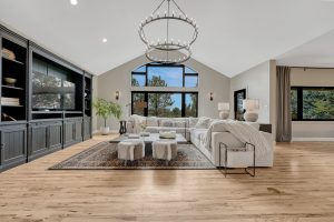 Open family room with soaring ceilings and large windows at 8422 Gopher Court Parker CO