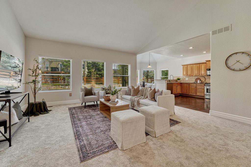 Bright open kitchen and family rooms at 7170 Windwood Way Parker CO