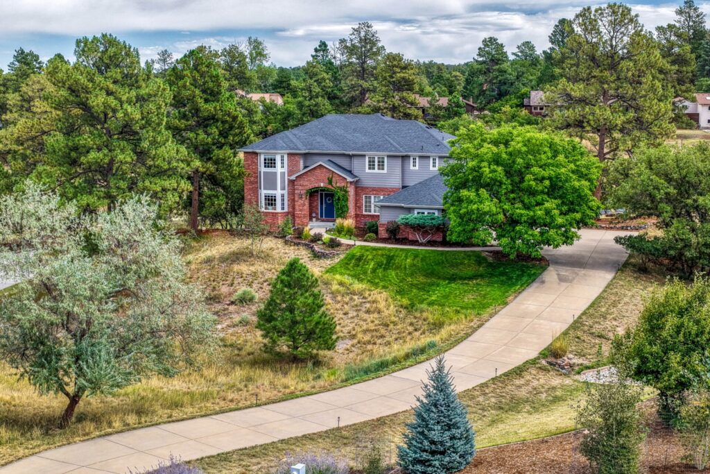 Home at 7763 Prairie Lake Trail in Parker Colorado backing to open space near Bingham Lake Trail.